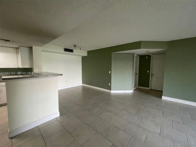 5005 Wiles Road 102, Coconut Creek, FL 33073