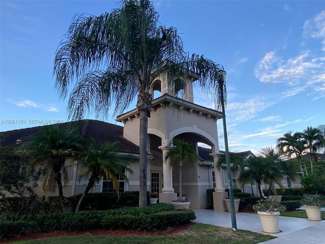 5005 Wiles Road 102, Coconut Creek, FL 33073