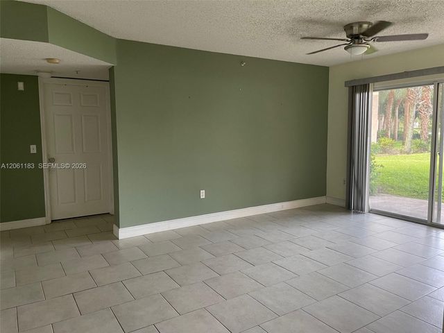 5005 Wiles Road 102, Coconut Creek, FL 33073