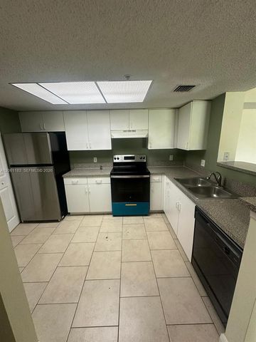 5005 Wiles Road 102, Coconut Creek, FL 33073