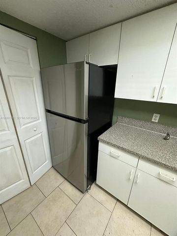 5005 Wiles Road 102, Coconut Creek, FL 33073