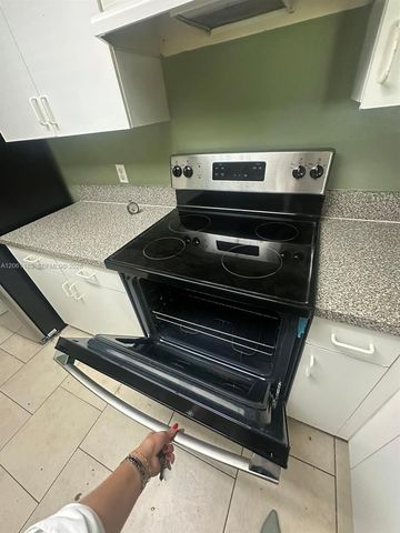 5005 Wiles Road 102, Coconut Creek, FL 33073