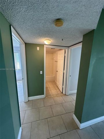 5005 Wiles Road 102, Coconut Creek, FL 33073