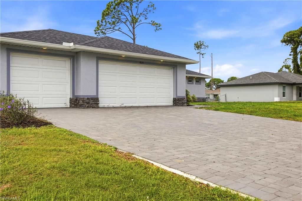 1024 NE 33rd LN, CAPE CORAL, FL 33909 — photo 4