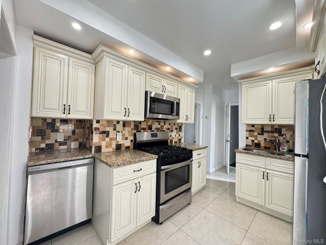33-28 105th Street, Corona, NY 11368
