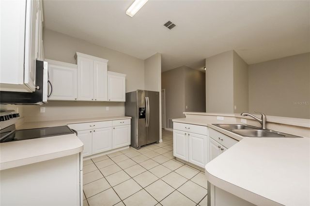 906 MENDOZA LANE, Kissimmee, FL 34758