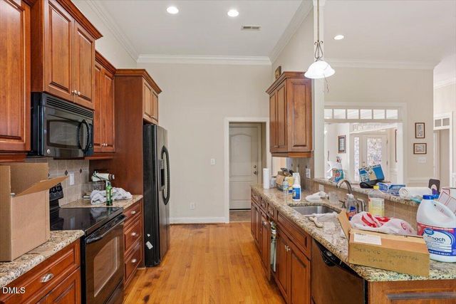 1428 Hopson Downs Court, Holly Springs, NC 27540
