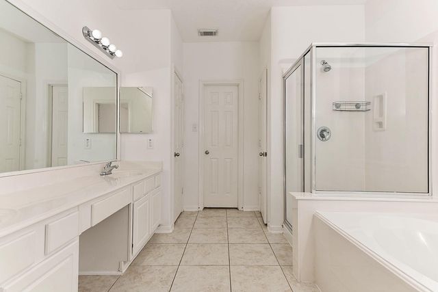 46 S April Mist Circle, Conroe, TX 77385