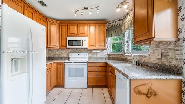 11295 Roundelay Road, Cooper City, FL 33026