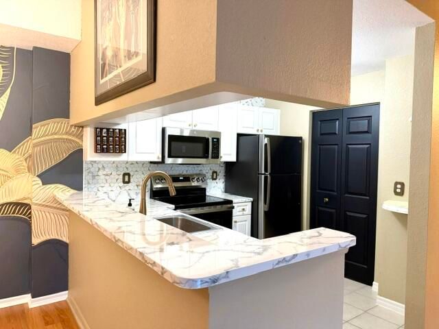 2915 Tuscany Court 201, Palm Beach Gardens, FL 33410