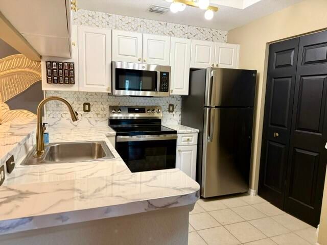 2915 Tuscany Court 201, Palm Beach Gardens, FL 33410