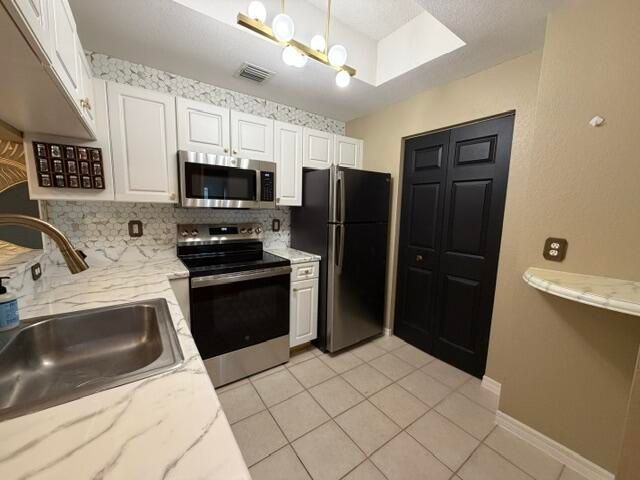 2915 Tuscany Court 201, Palm Beach Gardens, FL 33410