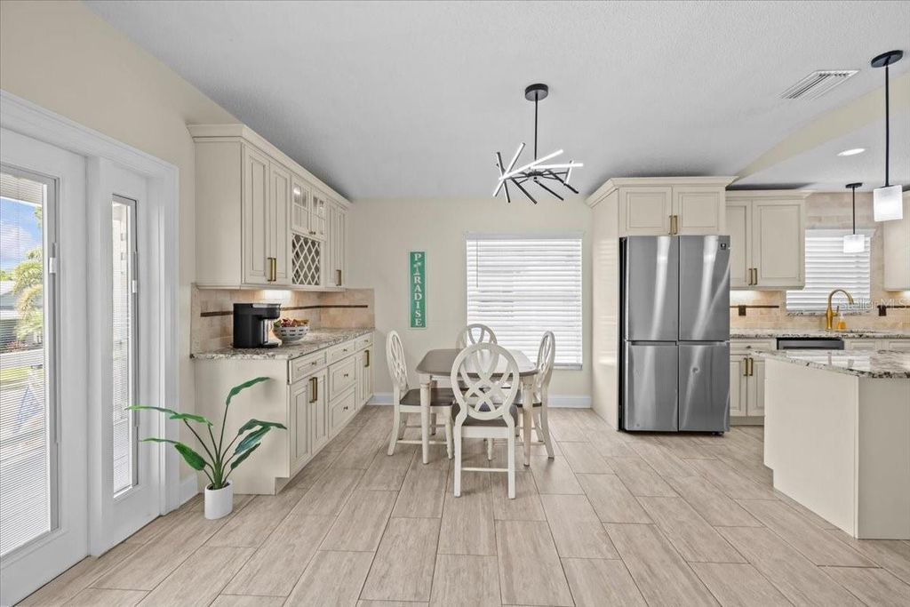 Image 6 of property listing at 7318 S KISSIMMEE STREET, Tampa, FL 33616