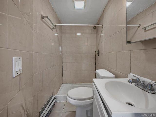 91 Elzey Avenue, Elmont, NY 11003