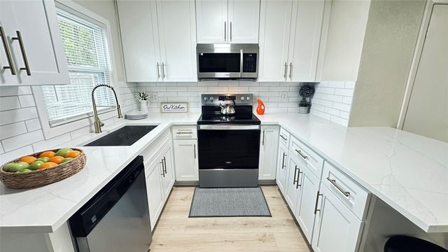 9434 Olde Village Court, Dallas, TX 75227