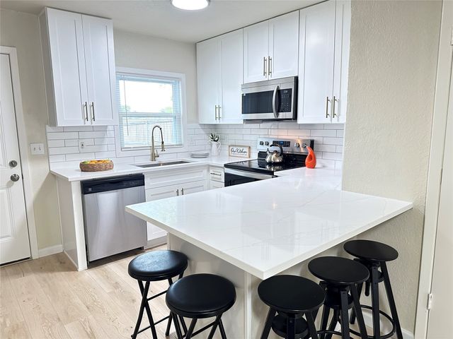 9434 Olde Village Court, Dallas, TX 75227