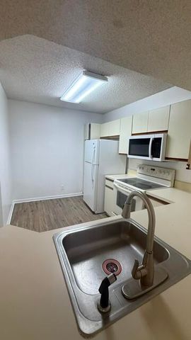 8741 Wiles Road 305, Coral Springs, FL 33067