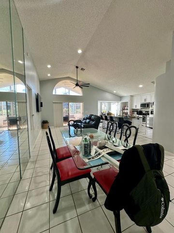 119 Hammocks Court, Greenacres, FL 33413