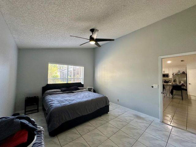 119 Hammocks Court, Greenacres, FL 33413