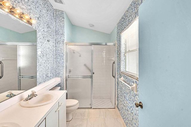 119 Hammocks Court, Greenacres, FL 33413