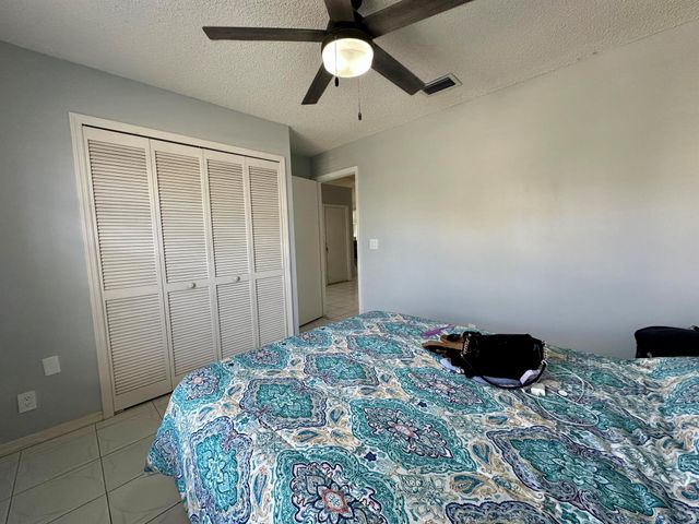 119 Hammocks Court, Greenacres, FL 33413