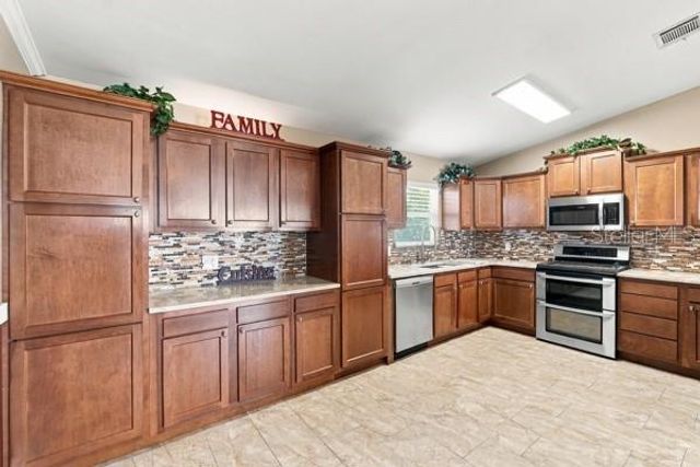 667 JAGUAR COURT, Poinciana, FL 34759