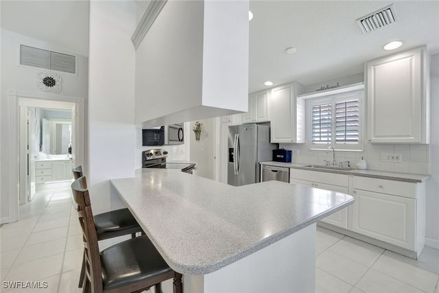 4724 Maupiti WAY, Naples, FL 34119