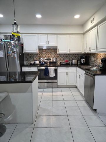 810 Sandtree Drive, Palm Beach Gardens, FL 33403