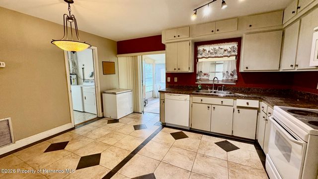 7156 Spring Hill Drive, Spring Hill, FL 34606