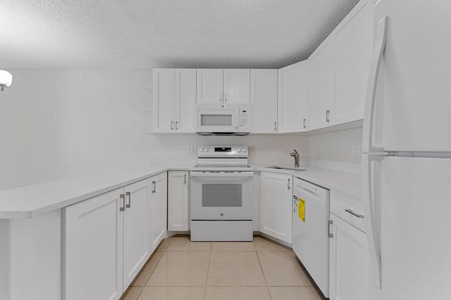 537 Shady Pine Way, Greenacres, FL 33415