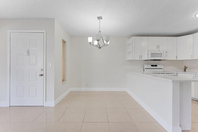 537 Shady Pine Way, Greenacres, FL 33415