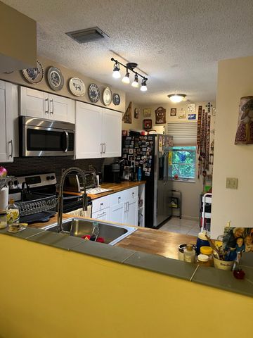 14888 WEDGEFIELD Drive 207, Delray Beach, FL 33446