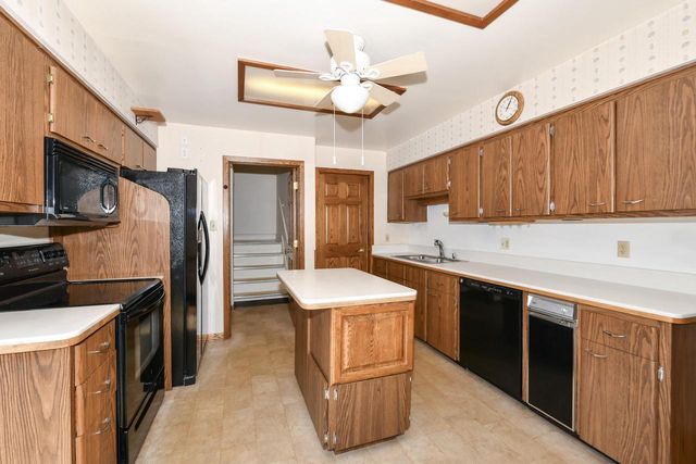 6919 W Bluemound ROAD, Wauwatosa, WI 53213