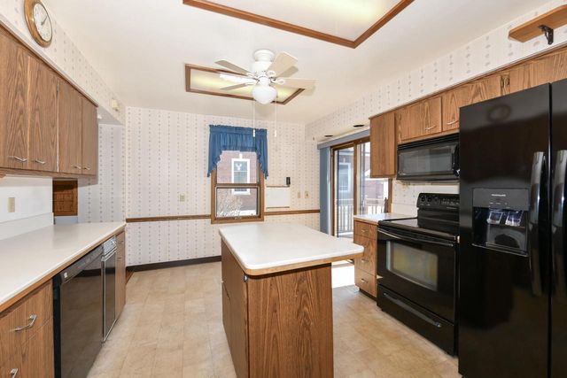 6919 W Bluemound ROAD, Wauwatosa, WI 53213