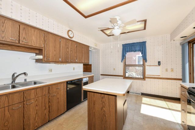 6919 W Bluemound ROAD, Wauwatosa, WI 53213