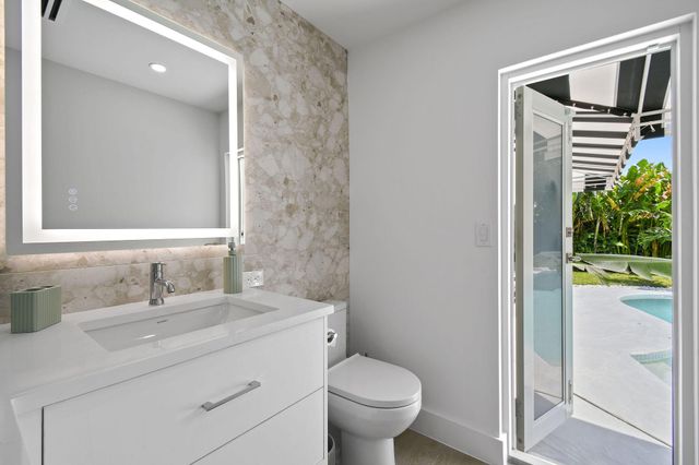 7710 W Lake Drive, Lake Clarke Shores, FL 33406