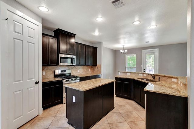 59 Beaconsfield Drive, Magnolia, TX 77355