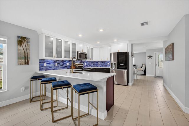 452 SE Asbury Lane, Port St Lucie, FL 34983