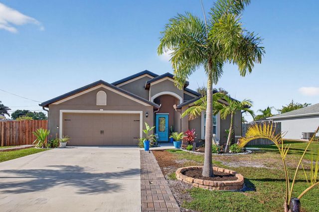 452 SE Asbury Lane, Port St Lucie, FL 34983