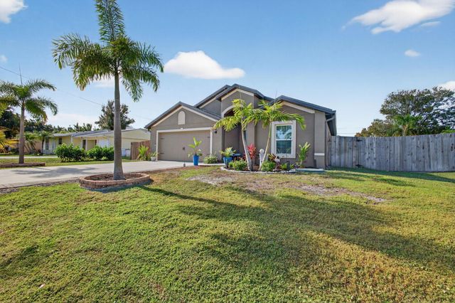 452 SE Asbury Lane, Port St Lucie, FL 34983