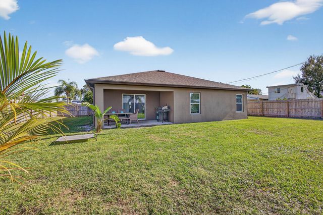 452 SE Asbury Lane, Port St Lucie, FL 34983