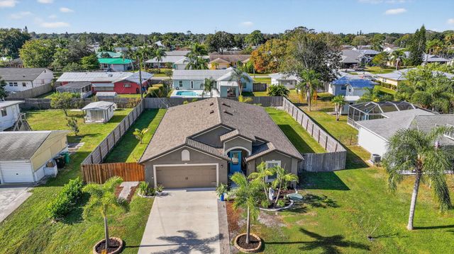 452 SE Asbury Lane, Port St Lucie, FL 34983