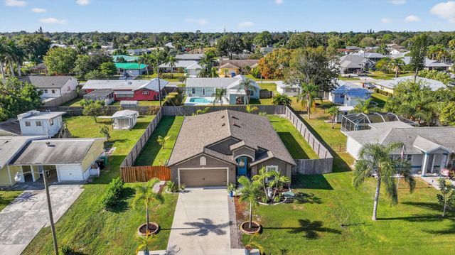 452 SE Asbury Lane, Port St Lucie, FL 34983