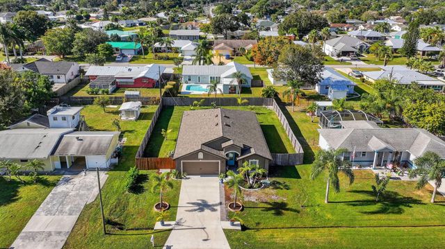 452 SE Asbury Lane, Port St Lucie, FL 34983
