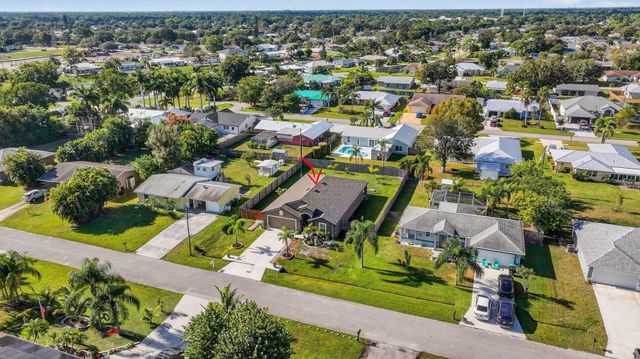 452 SE Asbury Lane, Port St Lucie, FL 34983
