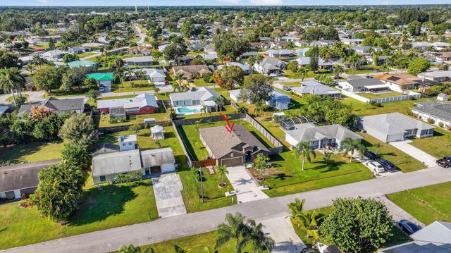 452 SE Asbury Lane, Port St Lucie, FL 34983