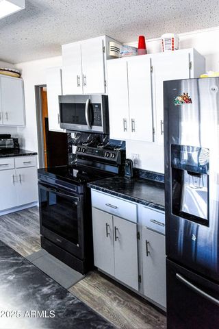 5674 S MIAMI GARDENS Drive, Miami, AZ 85539