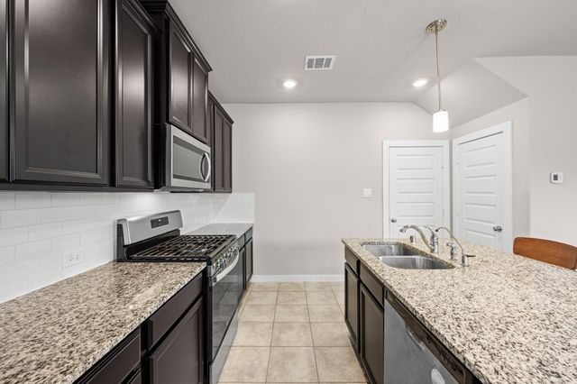 9718 Grooveburr Court, Conroe, TX 77385