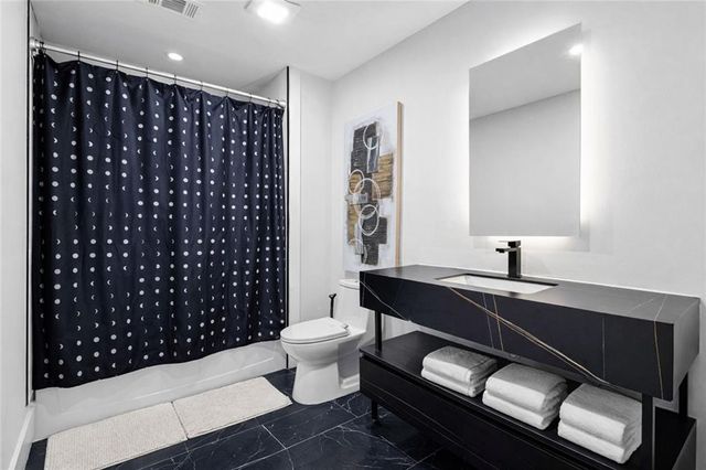 915 Lost Forest NW Drive, Atlanta, GA 30328