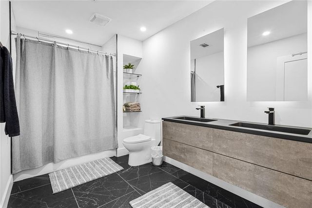 915 Lost Forest NW Drive, Atlanta, GA 30328